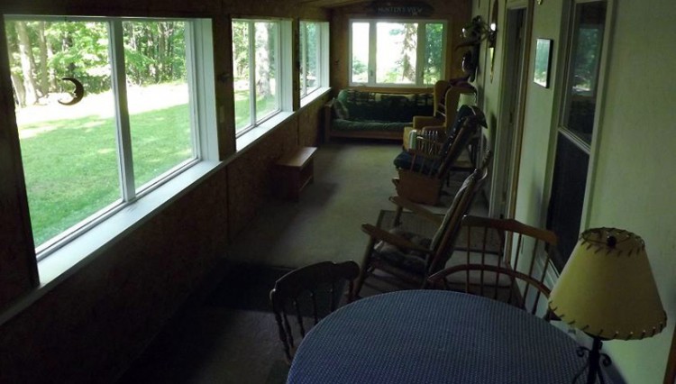 Hunter's View cabin porch overlooking woods