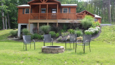Single Island Shores inviting outdoor area with firepit