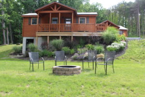 SIngle Island Shores inviting cabin with outdoor fire pit